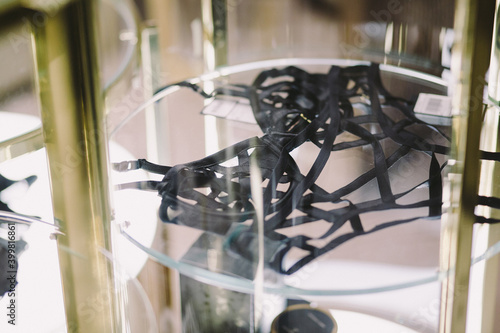 Different bra and panties on pink background. Colorful women sexy underwear. Top view, flat lay. Female wardrobe, shopping concept. Fashion lace lingerie. Black and beige. Big choice of gorgeous bras