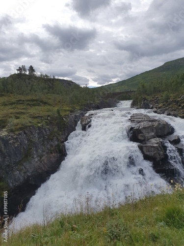 landscape with water flowing among the rocks - V  ringsfossen