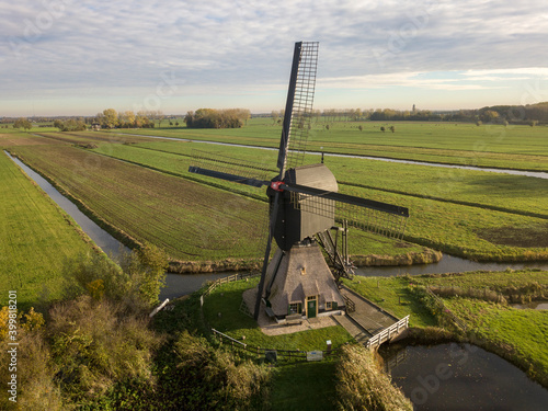 Windmill in a typical Dutch landscape