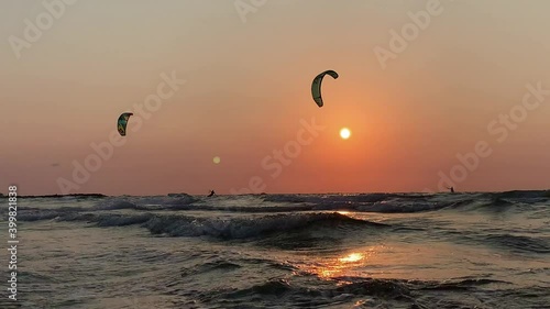 kitesurfing at sunset on the mediterranean sea. Netanya  Israel