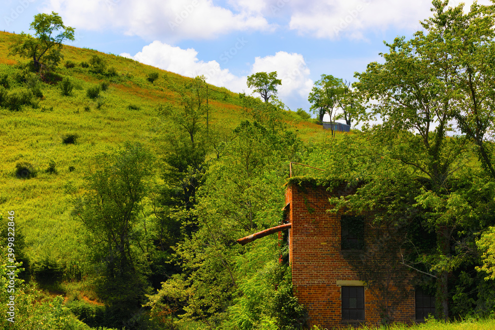 Old brick building on a country hillside in rural Virginia