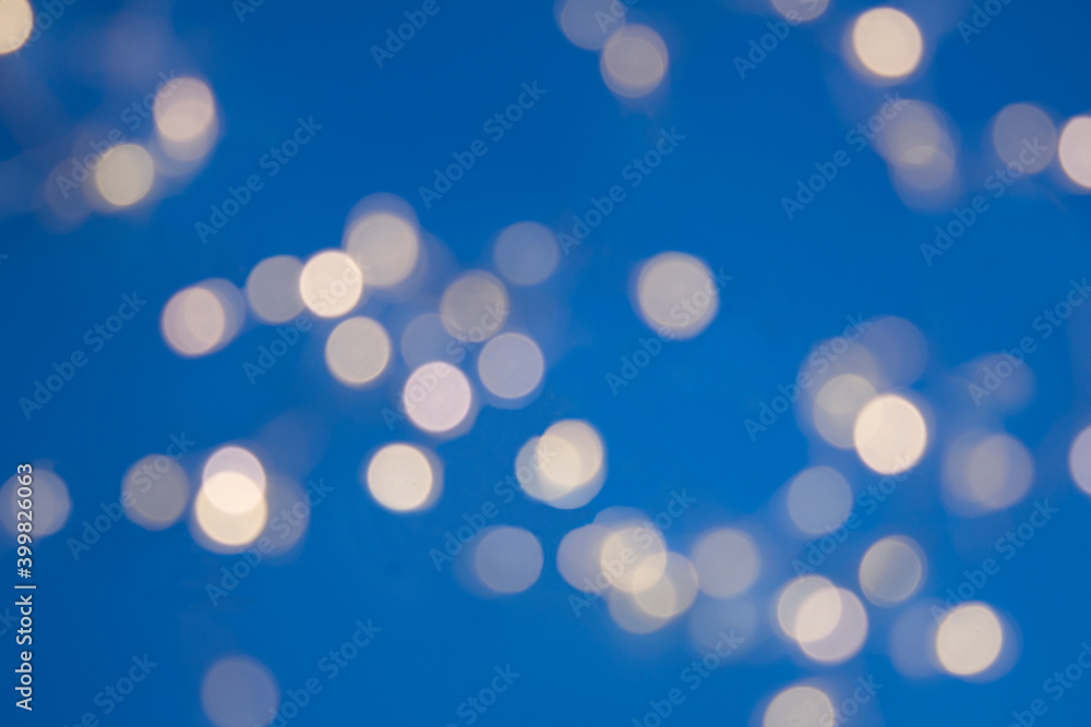 Festive blue  background of glowing garland