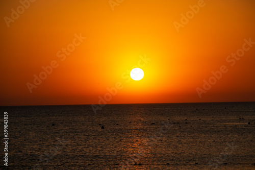 Sunset on the background of the sea
