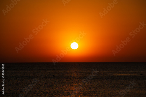 Sunset on the background of the sea