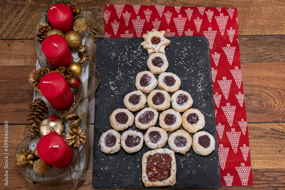Coconut biscuits filled with different flavor jam, raspberry, strawberries, apricot
