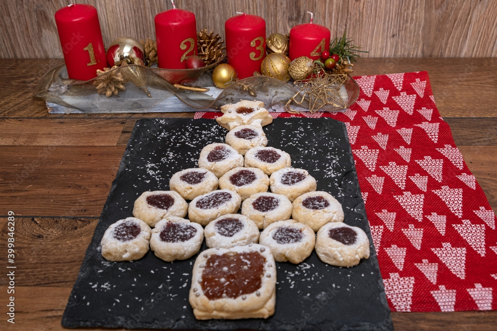 Homemade coconut biscuits filled with different flavor jam, raspberry, strawberries, apricot