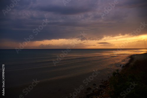 sunset on the beach © Alexander