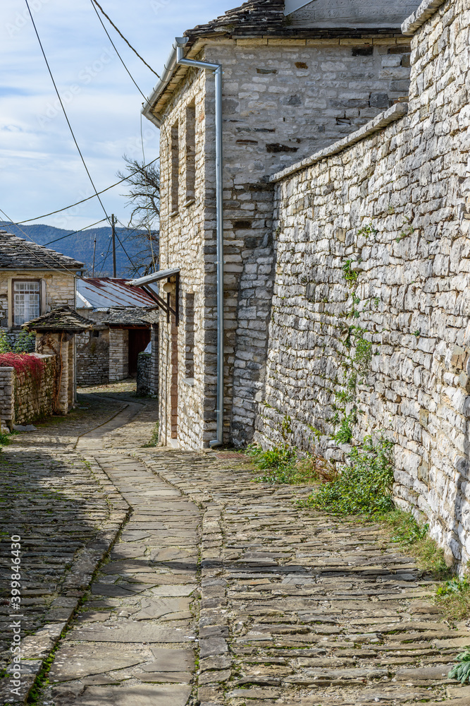 The picturesque village of Koukouli during fall season with its architectural traditional old stone  buildings located on Tymfi mount, Zagori, Epirus, Greece, Europe