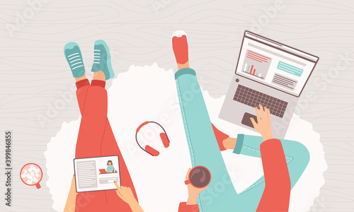 Woman and man freelancers are sitting with a laptop and a tablet on the floor. Concept of family working remotely from home, programming, e-learning, blogging. Home office top view. Vector illustratio