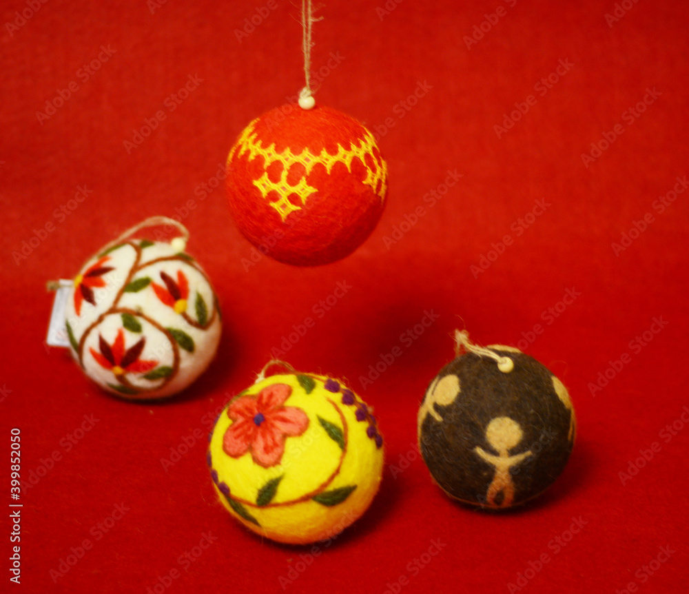 four toys Christmas trees from the quarter on a red background four toys Christmas trees from the quarter on a red background