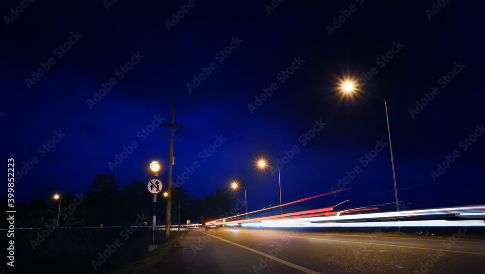 Long-exposure of traffic light trails at nigh.