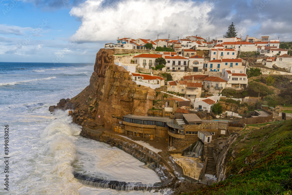 view of the cliffside village of Azenhas do Mar in central Portugal