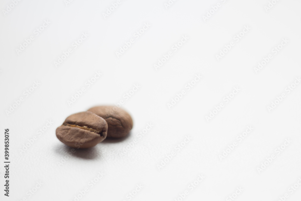 Naklejka premium coffee beans on white