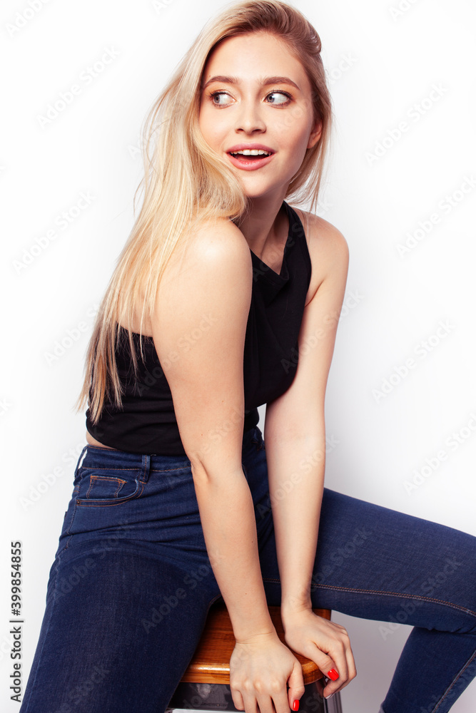 young blond woman on white backgroung gesture thumbs up, isolated emotional posing young blond woman on white backgroung gesture thumbs up, isolated emotional posing