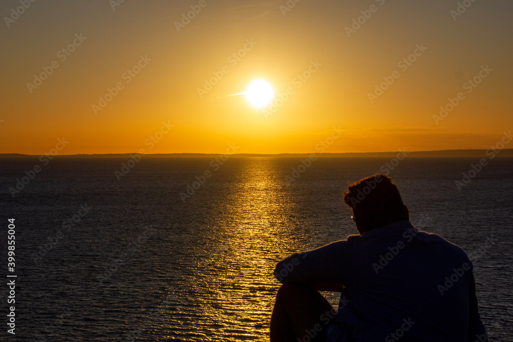 person watching sunset