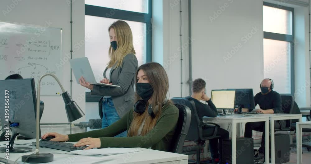 MS Office workers wearing masks during pandemic MS Office workers wearing masks during pandemic