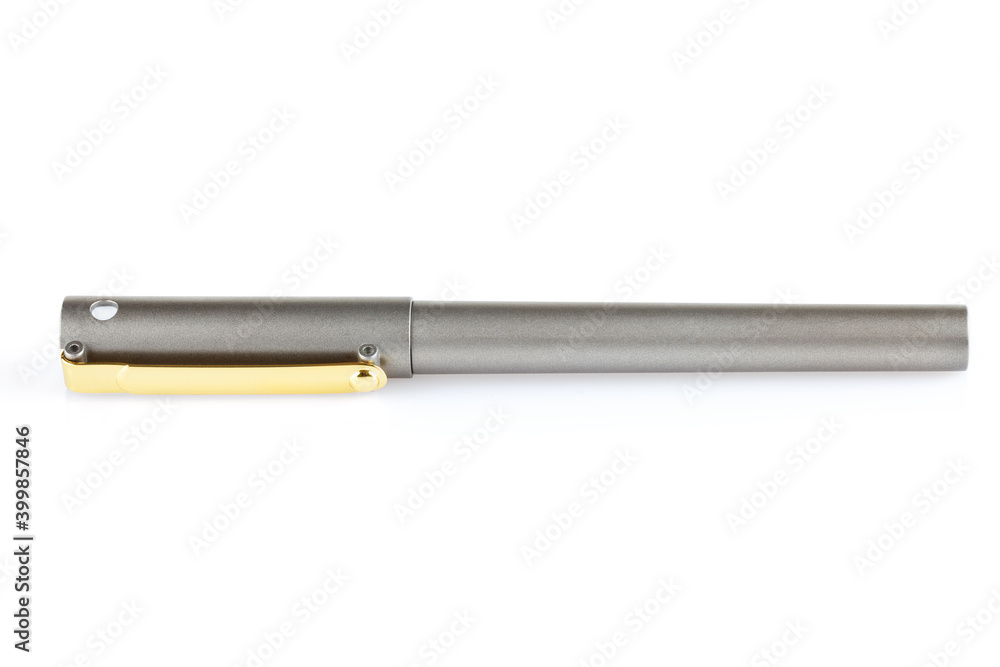Side view of a grey ballpoint pen, isolated on a white background. Close-up. Side view of a grey ballpoint pen, isolated on a white background. Close-up.