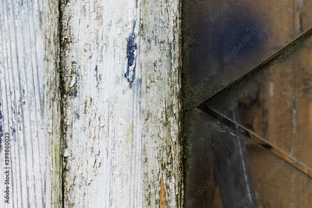 Broken glass in an old wooden frame Broken glass in an old wooden frame