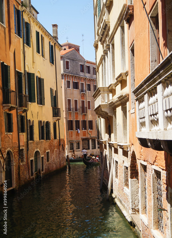 Gondola in picturesque Venice Canal - Venice, Italy