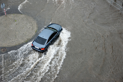 Heavy rains caused flooding on the city's roads.