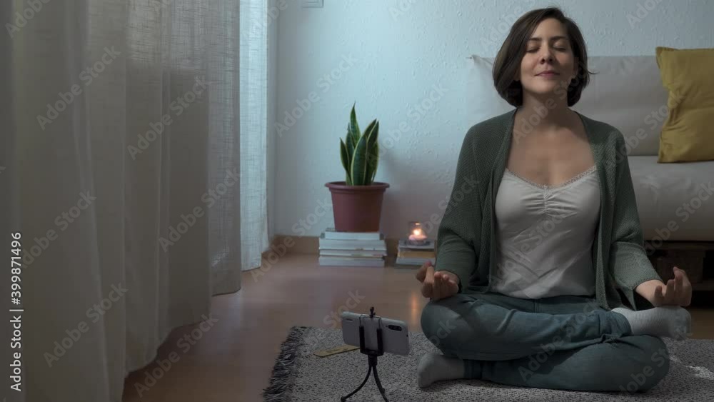 Happy woman streaming meditation online masterclass webinar lesson at home - Mindfulness concept - Focus on face Happy woman streaming meditation online masterclass webinar lesson at home - Mindfulness concept - Focus on face