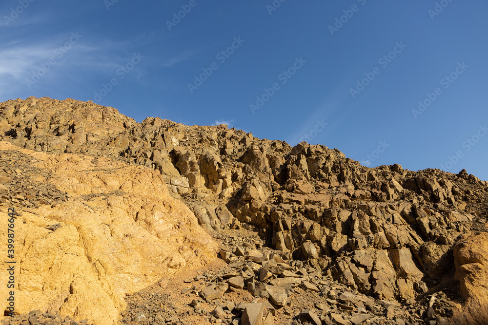Coloured Canyon in Dahab on South Sinai (Egypt) peninsula. Desert rocks of multicolored sandstone background.. Coloured Canyon in Dahab on South Sinai (Egypt) peninsula. Desert rocks of multicolored sandstone background..