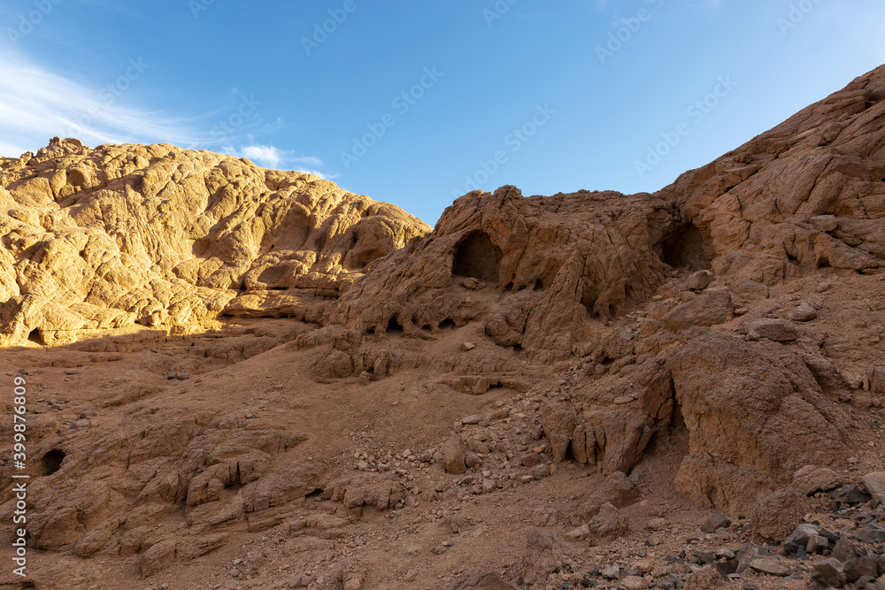 Coloured Canyon in Dahab on South Sinai (Egypt) peninsula. Desert rocks of multicolored sandstone background..