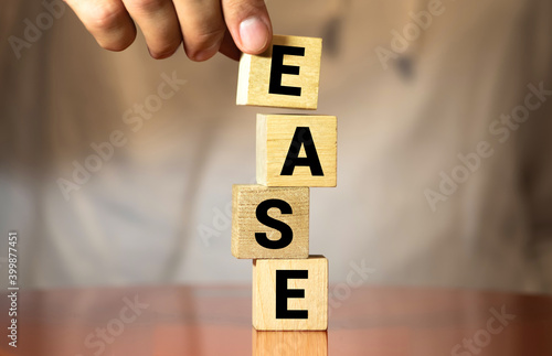 EASE word made with building blocks isolated on white