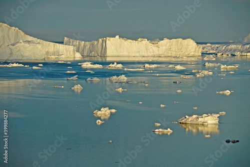 Icebergs in Disko Bay, Ilulissat, West Greenland photo