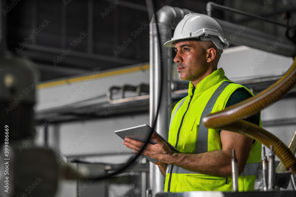 factory engineer checking processing equipments get ready for production factory engineer checking processing equipments get ready for production