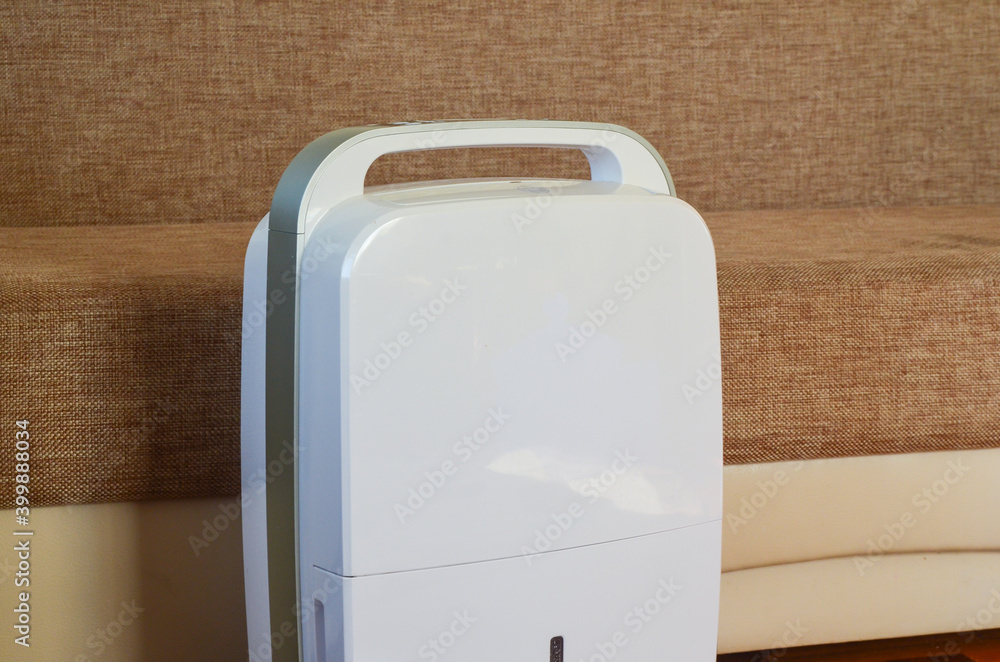 dehumidifier in the room close up, modern technology for the climate in the apartment