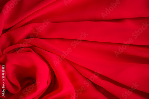 Red fabric or luxury silk satin for background.