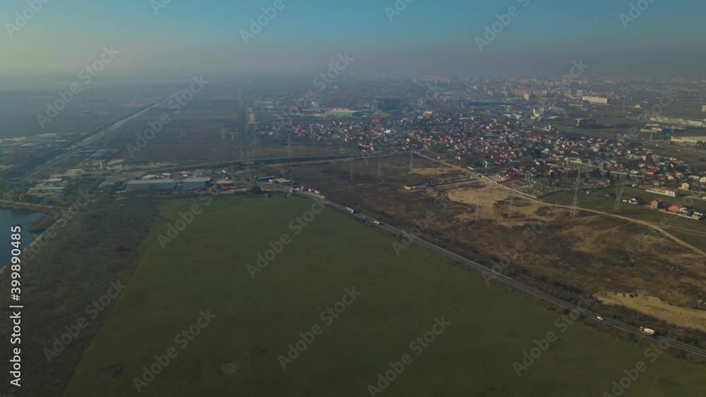 Aerial shot of an industrial polluted area with electricity towers Aerial shot of an industrial polluted area with electricity towers