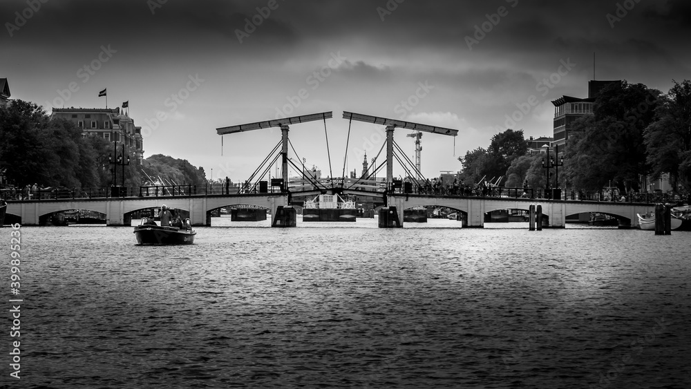Magerebrug (Skinny Bridge) over the Amstel River in the historic center of Amsterdam, the Netherlands
