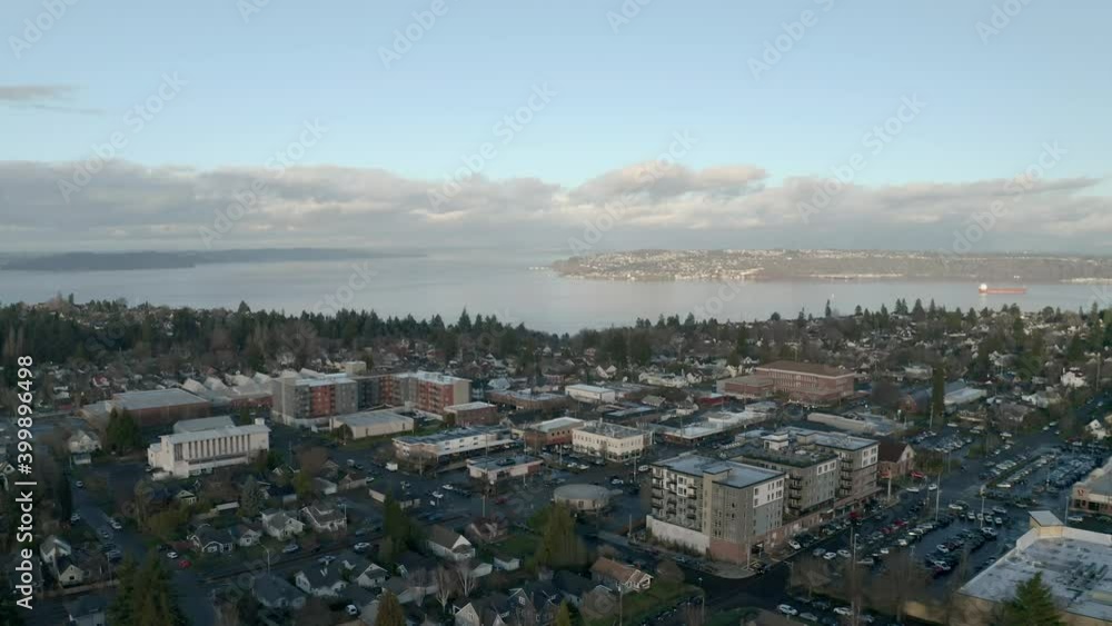 Aerial View Of Urban Landscape By The Calm River In Proctor District, Tacoma, Washington - aerial drone shot Aerial View Of Urban Landscape By The Calm River In Proctor District, Tacoma, Washington - aerial drone shot