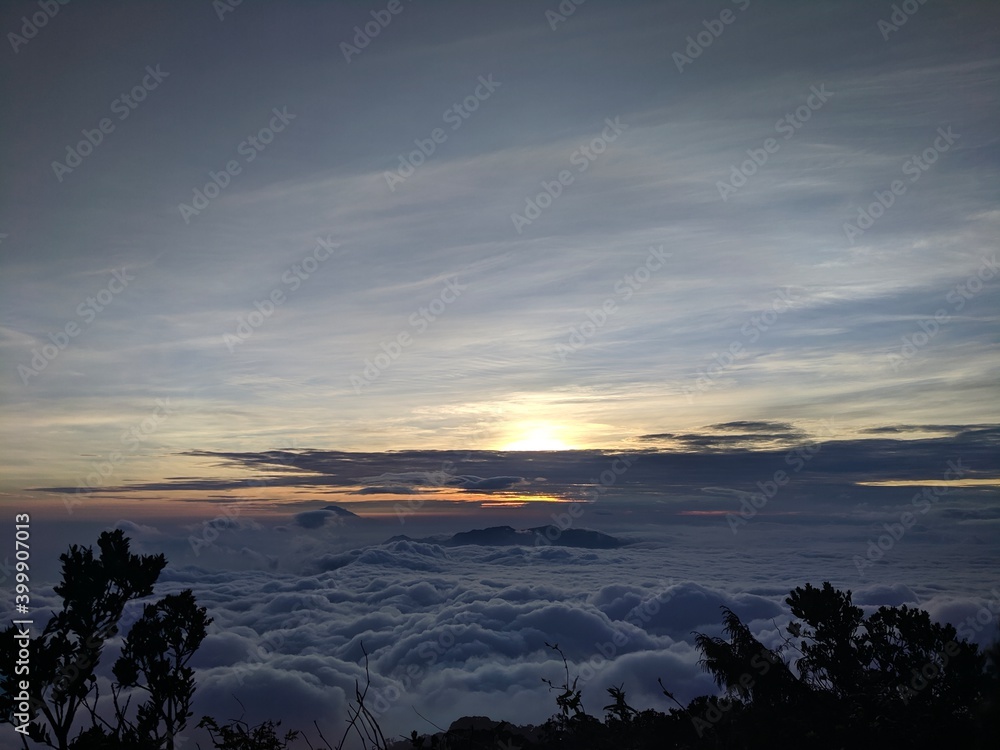 Garut, Indonesia - Juni 13th, 2020: The sun sets on the top of the mountain Garut, Indonesia - Juni 13th, 2020: The sun sets on the top of the mountain