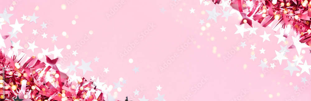 Pink tinsel decor banner. Christmas, new year horizontal template with star confetti, garland lights Pink tinsel decor banner. Christmas, new year horizontal template with star confetti, garland lights