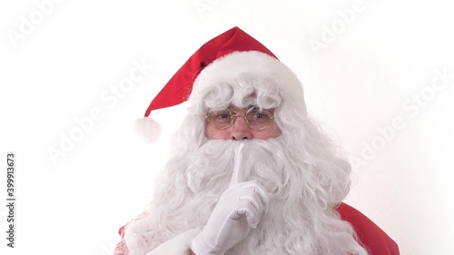 Santa claus on an isolated white background in a red bone with a beard. New Year and Christmas holidays. Fancy dress costume. The main character of the celebration. A magical and fantastic celebration