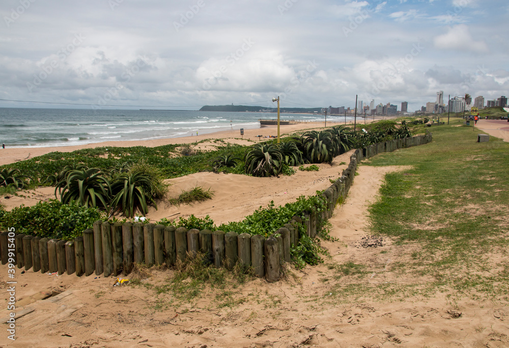 Wooden Pillars Holding Back Beach Sand at Durban South Africa