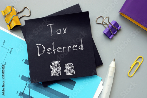 Financial concept about Tax Deferred with phrase on the page.