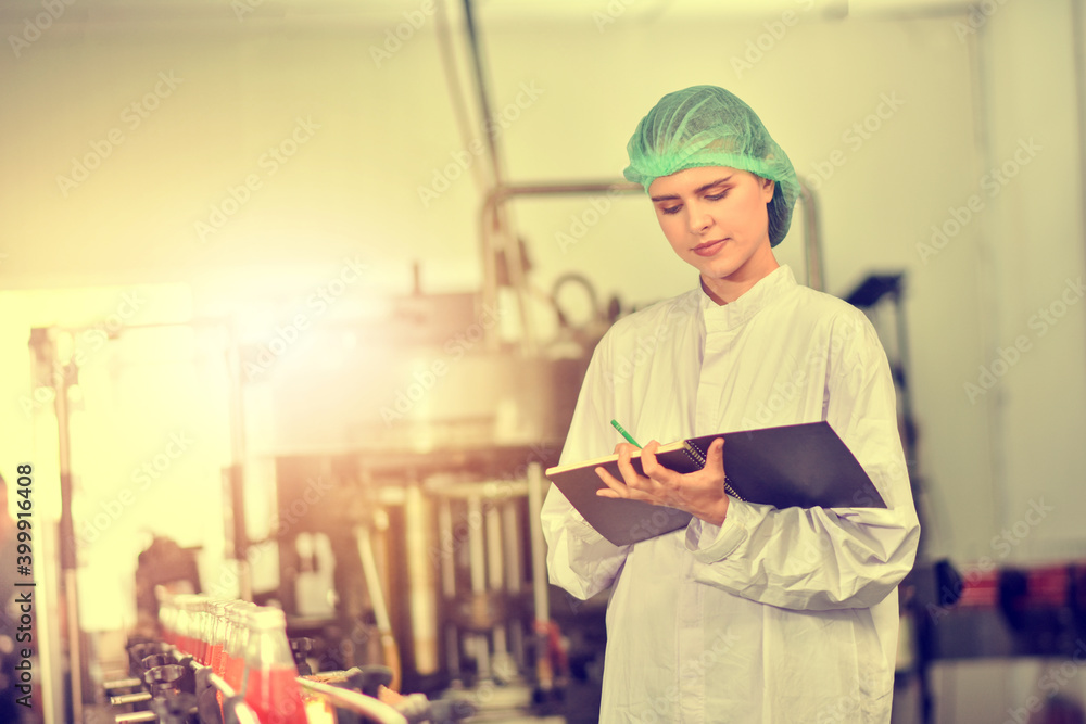 Women inspection quality control in beverage factory Women inspection quality control in beverage factory