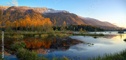 Autumn sunset panorama format photo of Cheam Lake Wetlands Regional Park with the Mount Cheam in the background, Rosedale,