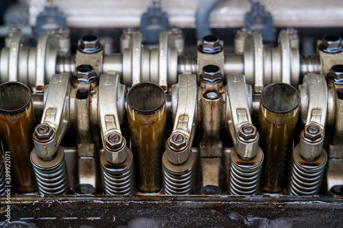 Photography Close up Arm valve rocker of Single Over Head Camshaft engine