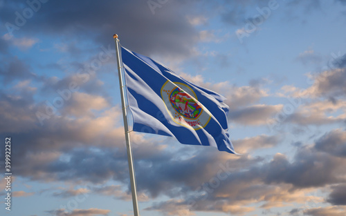 Minnesota US State Flag at sky background photo