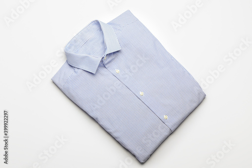 New male shirt on white background