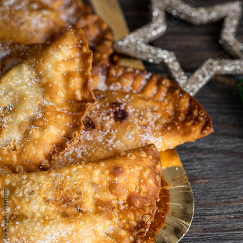 Trucha, spanish sweet made  fried pasty and filled with cabell angel or sweet potatoes  and consumed  in the Canary Islands during the Christmas photo