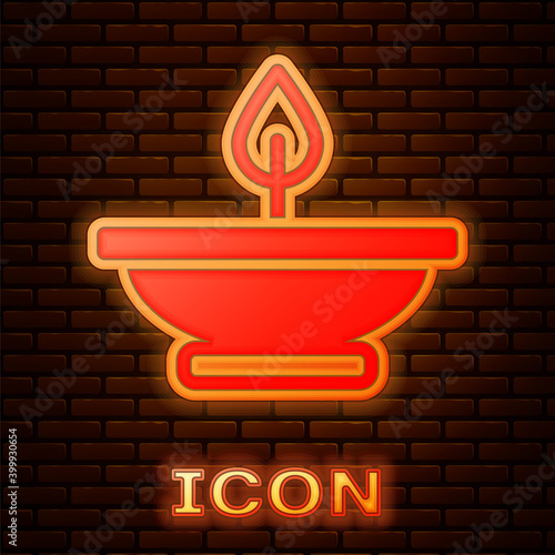 Glowing neon Aroma lamp icon isolated on brick wall background. Vector.