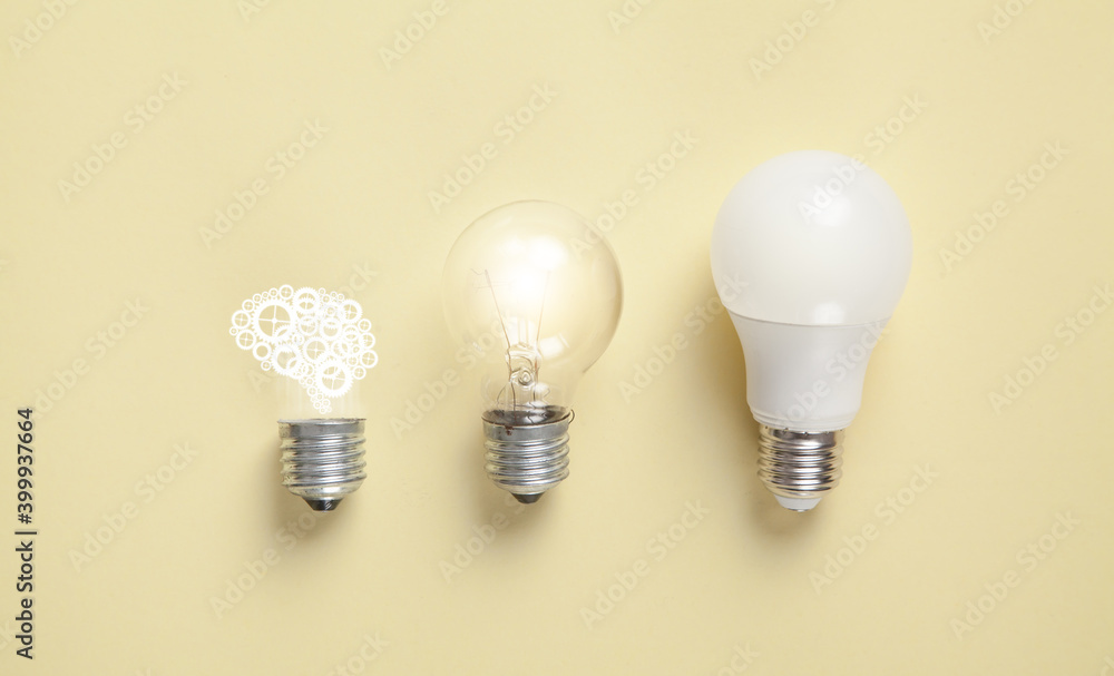 Light bulb and human brain on the yellow background. Idea. Brainstorming Light bulb and human brain on the yellow background. Idea. Brainstorming