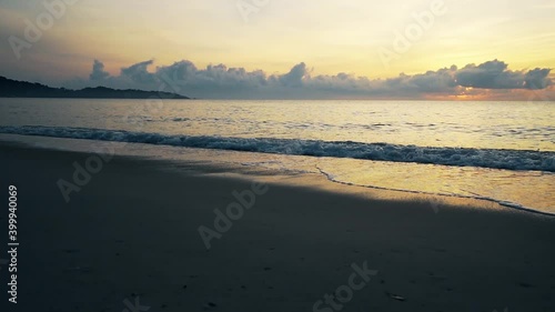 Wallpaper Mural Tropical deserted sandy beach at sunrise. The sound of the surf . Slow motion video. Torontodigital.ca