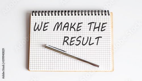 Wallpaper Mural Notepad with text WE MAKE THE RESULT on a white background,Business concept. Torontodigital.ca